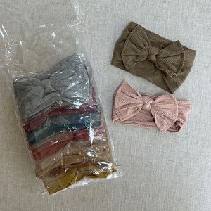 12 Brand new in package never used baby girl headbands with bow